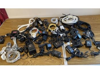Lot Of Power Supplies Transformers Chargers Coax Cables Phone Wires Audio Wires AC Plugs And HDMI Cables