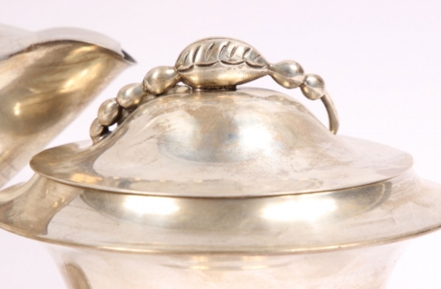 an antique sterling piece sold on an AuctionNinja marketplace.
