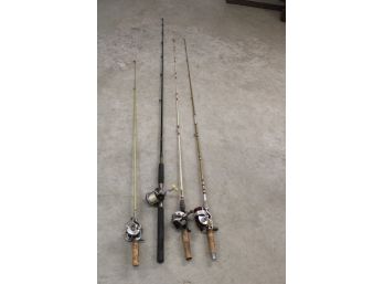 4 Fishing Rods  & Reels-   (267)