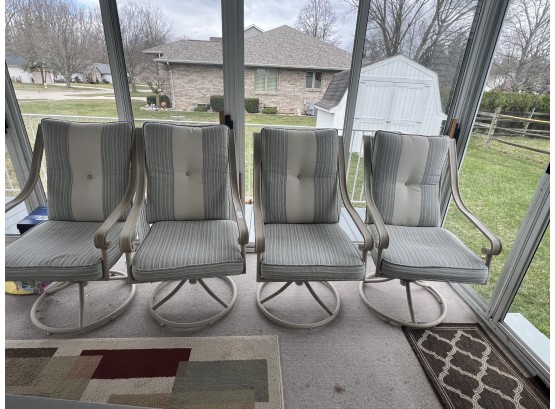 Lot Of Four Swivel Patio Chairs