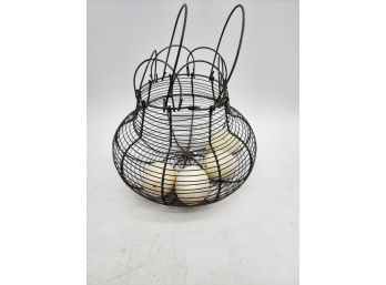Vintage Wire Egg Basket With A Couple Blown Out Eggs