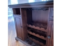 A Moveable Granite Top Bar With Bar Brass Rail