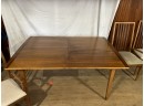 Dining Room Table And 4 Chairs (2 Are Captains Chairs) 60x40, A Leaf Is Included.