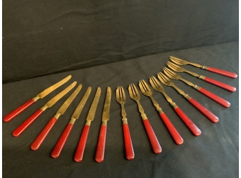 Set Of Red Handled Brass Silverware